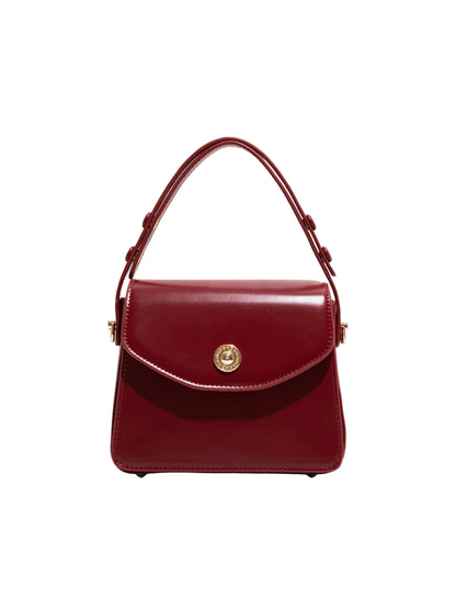 Structured Rectangular Bag with Top Handle and Gold-Tone Turn-Lock Closure
