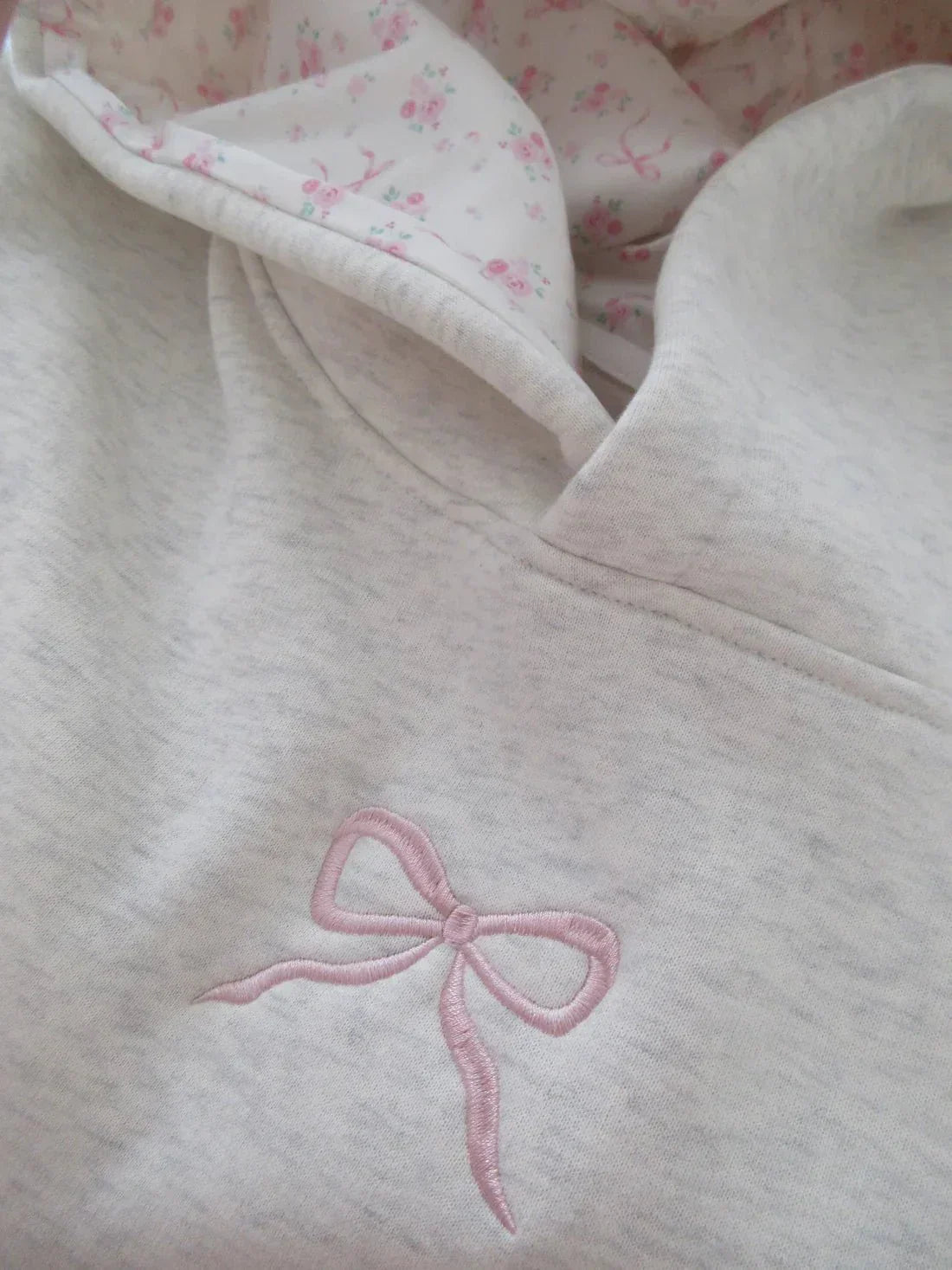 Relaxed Fit Pullover Hoodie with Hood and Embroidered Bow Detail